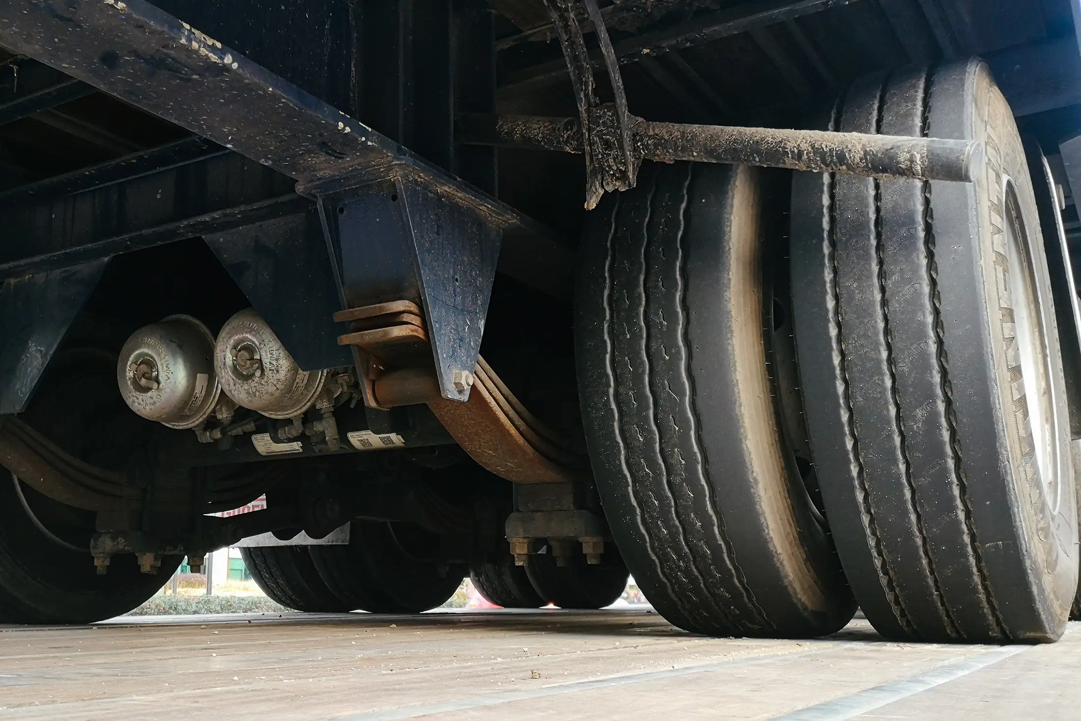 Mechanic performing a thorough truck and trailer inspection and repair in Douglasville